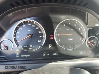 2015 BMW M6 z VIN WBS6C9C51FD467872, wystawiony jako Copart lot #79107574 z przebiegiem 79 139 mil mil oraz Szkoda całkowita • Salvage title. Historia ofert i sprzedaży dostępna na DreamBid. Obrazek 9.