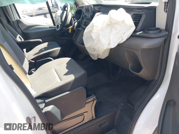 2023 Ford Transit Cargo with VIN 1FTYE1Y82PKA84762, listed as a IAAI auction lot 41718720 with 21,029 mi miles and . Bid and sale history available at DreamBid. Image 5.