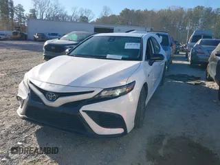 2023 Toyota Camry SE with VIN 4T1T11AKXPU167223, listed as a IAAI auction lot 41667076 with 31,658 mi miles and . Bid and sale history available at DreamBid. Image 2.