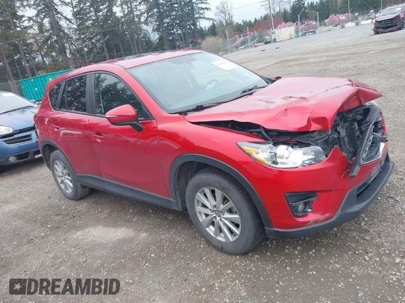 2016 Mazda CX-5 Touring with VIN JM3KE4CY2G0894930, listed as a IAAI auction lot 41906809 with 123,125 mi miles. Bid and sale history available at carsss.com. Image 1.