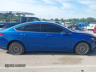 2018 Ford Fusion Titanium with VIN 3FA6P0D92JR205597, listed as a IAAI auction lot 42585935 with 146,072 mi miles and . Bid and sale history available at DreamBid. Image 13.