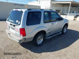 2001 Ford Explorer Sport z VIN 1FMYU60E71UC52372, wystawiony jako IAAI lot #41739367 z przebiegiem 137 960 mil mil oraz . Historia ofert i sprzedaży dostępna na DreamBid. Obrazek 4.