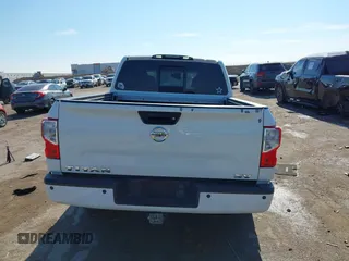 2017 Nissan Titan SL with VIN 1N6AA1E64HN565318, listed as a IAAI auction lot 41322120 with 114,515 mi miles and . Bid and sale history available at DreamBid. Image 16.