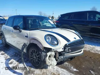 2019 MINI Hardtop 4 Door Cooper with VIN WMWXU1C59K2F82087, listed as a IAAI auction lot 41604354 with 71,729 mi miles and . Bid and sale history available at DreamBid. Image 1.