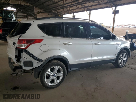 2015 Ford Escape SE with VIN 1FMCU9GX2FUB49175, listed as a Copart auction lot 54582125 with 90,544 mi miles and Salvage Title. Bid and sale history available at DreamBid. Image 3.
