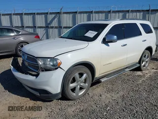 2013 Dodge Durango Citadel with VIN 1C4SDHET0DC571961, listed as a IAAI auction lot 42050261 with 257,637 mi miles and . Bid and sale history available at DreamBid. Image 17.