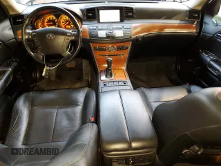 2006 Infiniti M45 with VIN JNKBY01E06M207743, listed as a Copart auction lot 77743934 with 158,510 mi miles and Salvage Title. Bid and sale history available at carsss.com. Image 8.