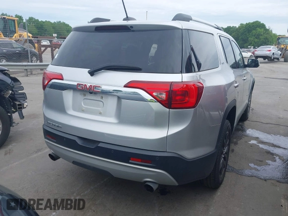 2017 GMC Acadia SLT with VIN 1GKKNMLS8HZ184064, listed as a IAAI auction lot 42113172 with 118,769 mi miles. Bid and sale history available at carsss.com. Image 4.