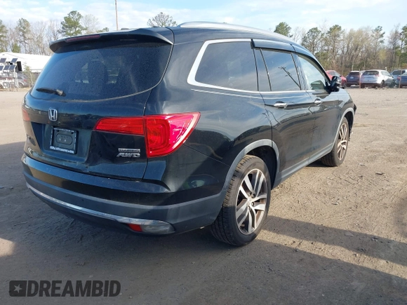 2017 Honda Pilot Touring with VIN 5FNYF6H9XHB062171, listed as a IAAI auction lot 41927969 with 210,633 mi miles. Bid and sale history available at carsss.com. Image 4.