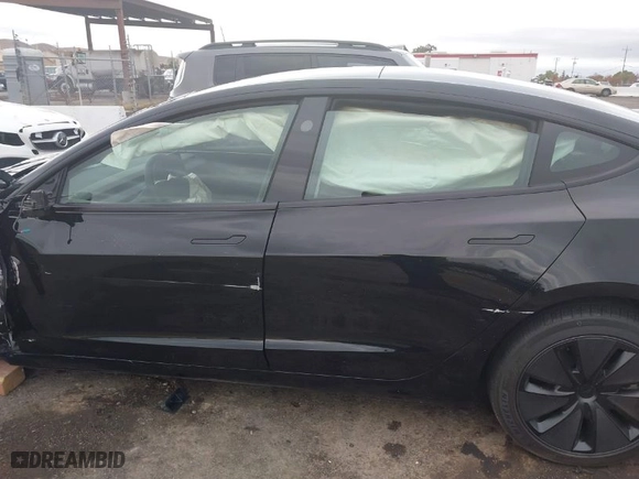 2024 Tesla Model 3 with VIN 5YJ3E1EA3RF847289, listed as a IAAI auction lot 40880916 with NaN miles. Bid and sale history available at carsss.com. Image 13.