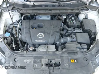 2016 Mazda CX-5 Grand Touring with VIN JM3KE2DY0G0870077, listed as a IAAI auction lot 42158225 with 93,816 mi miles. Bid and sale history available at carsss.com. Image 10.
