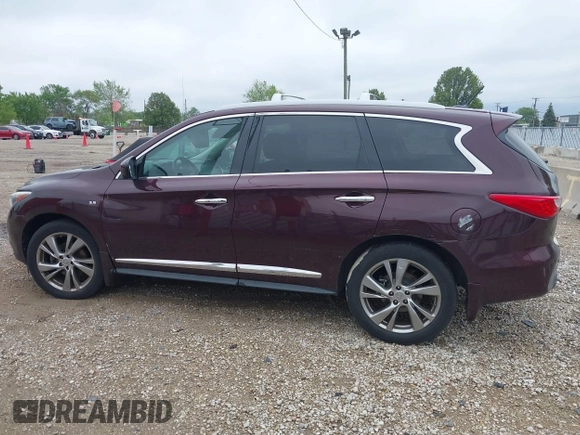 2015 Infiniti QX60 with VIN 5N1AL0MM7FC521700, listed as a IAAI auction lot 42310389 with 144,217 mi miles and . Bid and sale history available at DreamBid. Image 14.