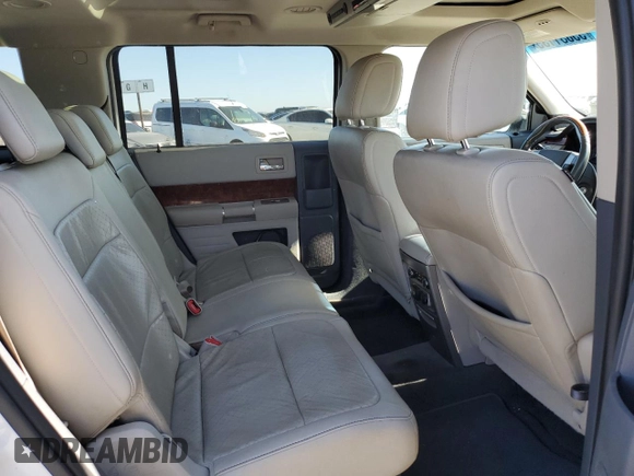 2009 Ford Flex Limited z VIN 2FMEK63C69BA03324, wystawiony jako Copart lot #55831135 z przebiegiem 202 031 mil mil oraz Czysty tytuł • Clean title. Historia ofert i sprzedaży dostępna na DreamBid. Obrazek 11.