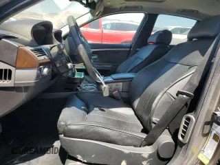 2007 BMW 7 Series 750i with VIN WBAHL83527DT09744, listed as a Copart auction lot 62309195 with 118,242 mi miles and Salvage title. Bid and sale history available at DreamBid. Image 7.