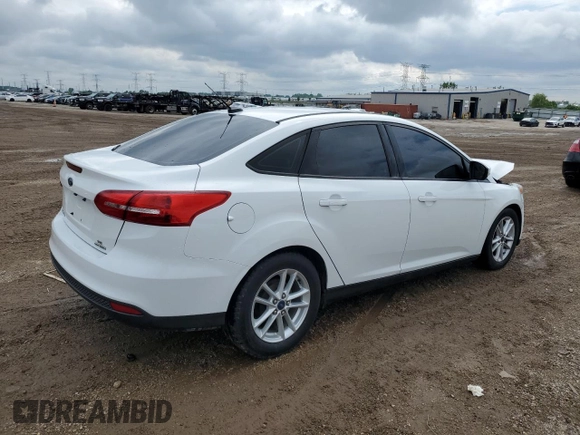 2016 Ford Focus SE с VIN 1FADP3F27GL222556, выставлен на аукционе Copart как лот 59638585 с пробегом 125 648 миль миль и Списание • Salvage title. История ставок и продаж доступна на DreamBid. Изображение 3.