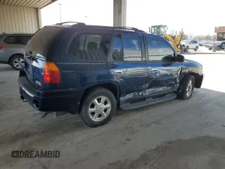 2004 GMC Envoy SLE with VIN 1GKDT13S142201271, listed as a Copart auction lot 50249705 with 248,364 mi miles and Salvage Title. Bid and sale history available at carsss.com. Image 3.