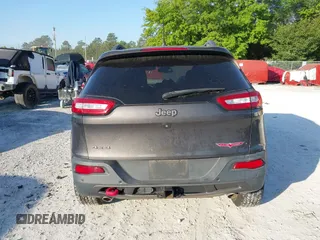 2018 Jeep Cherokee Trailhawk with VIN 1C4PJMBX7JD517299, listed as a IAAI auction lot 42022770 with 62,865 mi miles. Bid and sale history available at carsss.com. Image 17.