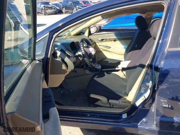 2006 Honda Civic Sdn EX with VIN 1HGFA16816L058198, listed as a IAAI auction lot 41998899 with 147,529 mi miles. Bid and sale history available at carsss.com. Image 5.
