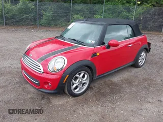 2011 MINI Convertible with VIN WMWZN3C59BTZ89447, listed as a IAAI auction lot 42313009 with 62,009 mi miles and . Bid and sale history available at DreamBid. Image 2.