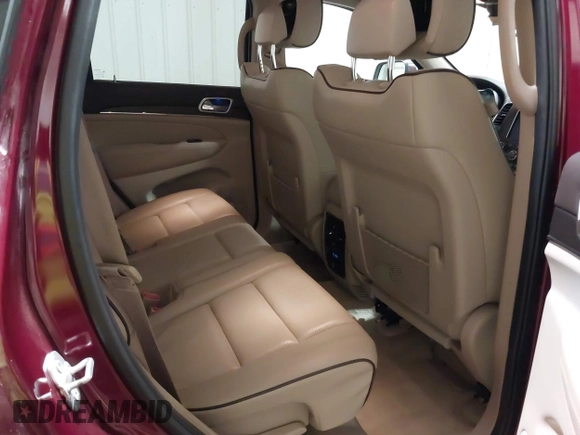 2018 Jeep Grand Cherokee High Altitude with VIN 1C4RJFCG6JC215902, listed as a IAAI auction lot 41866716 with 76,282 mi miles. Bid and sale history available at carsss.com. Image 8.
