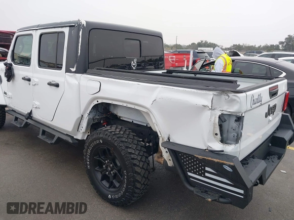 2021 Jeep Gladiator Willys with VIN 1C6HJTAG1ML575474, listed as a IAAI auction lot 41439898 with 44,335 mi miles and . Bid and sale history available at DreamBid. Image 6.