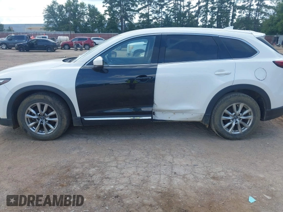 2018 Mazda CX-9 Touring with VIN JM3TCACY7J0222569, listed as a IAAI auction lot 42670932 with 130,644 mi miles and . Bid and sale history available at DreamBid. Image 14.