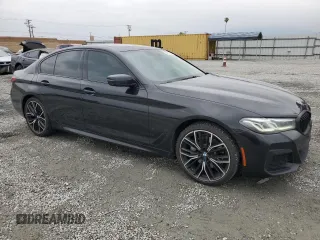 2021 BMW 5 Series 530e with VIN WBA13AG00MCF09677, listed as a Copart auction lot 54907205 with 50,033 mi miles and Salvage title. Bid and sale history available at DreamBid. Image 4.