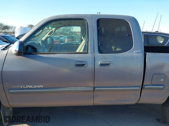 2000 Toyota Tundra SR5 with VIN 5TBRT3413YS019873, listed as a IAAI auction lot 41412497 with 305,472 mi miles and . Bid and sale history available at DreamBid. Image 14.
