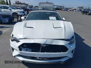 2018 Ford Mustang EcoBoost Premium z VIN 1FATP8UH8J5111364, wystawiony jako IAAI lot #42261261 z przebiegiem 102 703 mil mil oraz . Historia ofert i sprzedaży dostępna na DreamBid. Obrazek 13.