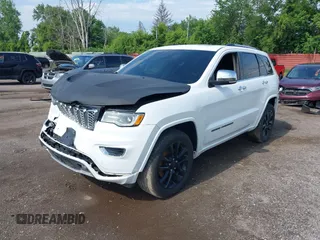 2017 Jeep Grand Cherokee Overland with VIN 1C4RJFCT6HC880306, listed as a IAAI auction lot 42534987 with 97,976 mi miles and . Bid and sale history available at DreamBid. Image 2.
