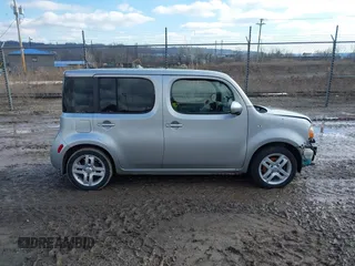 2009 Nissan Cube SL z VIN JN8AZ28R99T111414, wystawiony jako IAAI lot #41542454 z przebiegiem 117 297 mil mil oraz . Historia ofert i sprzedaży dostępna na DreamBid. Obrazek 13.