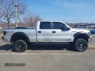 2014 Ford F-150 with VIN 1FTVW1EFXEKD65059, listed as a IAAI auction lot 41791605 with 146,190 mi miles and . Bid and sale history available at DreamBid. Image 13.