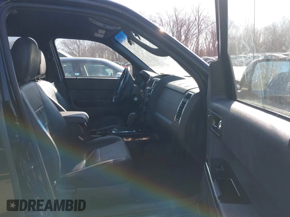 2010 Ford Escape Limited z VIN 1FMCU9E71AKB56741, wystawiony jako IAAI lot #41764959 z przebiegiem 216 816 mil mil oraz . Historia ofert i sprzedaży dostępna na DreamBid. Obrazek 5.
