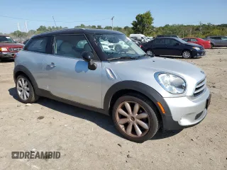 2015 MINI Paceman z VIN WMWSS1C56FWN94886, wystawiony jako Copart lot #70387184 z przebiegiem 98 574 mil mil oraz Szkoda całkowita • Salvage title. Historia ofert i sprzedaży dostępna na DreamBid. Obrazek 4.