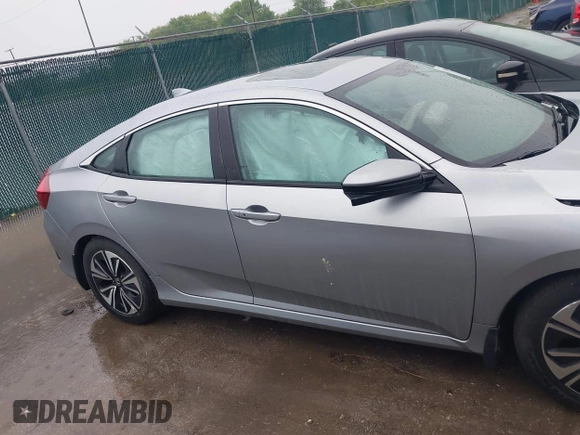 2016 Honda Civic EX-L z VIN 19XFC1F70GE003249, wystawiony jako IAAI lot #42430548 z przebiegiem 103 002 mil mil oraz . Historia ofert i sprzedaży dostępna na DreamBid. Obrazek 13.