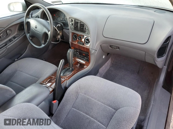 1997 Chrysler Sebring with VIN 4C3AU42N6VE180381, listed as a Copart auction lot 79449954 with 126,425 mi miles and Clean Title. Bid and sale history available at DreamBid. Image 8.