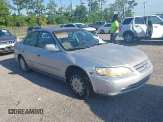 2002 Honda Accord LX z VIN 1HGCG56462A065742, wystawiony jako IAAI lot #42862037 z przebiegiem 126 149 mil mil oraz . Historia ofert i sprzedaży dostępna na DreamBid. Obrazek 1.