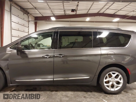 2017 Chrysler Pacifica Touring L with VIN 2C4RC1BG5HR803306, listed as a IAAI auction lot 41968455 with 84,714 mi miles and . Bid and sale history available at DreamBid. Image 15.