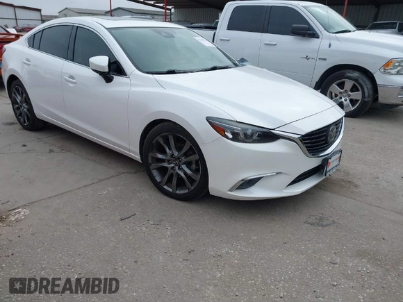 2017 Mazda 6 Grand Touring with VIN JM1GL1W57H1126716, listed as a IAAI auction lot 41619715 with 105,332 mi miles and . Bid and sale history available at DreamBid. Image 1.