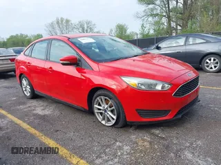 2015 Ford Focus SE z VIN 1FADP3F29FL244041, wystawiony jako IAAI lot #42053303 z przebiegiem 132 804 mil mil oraz . Historia ofert i sprzedaży dostępna na DreamBid. Obrazek 1.