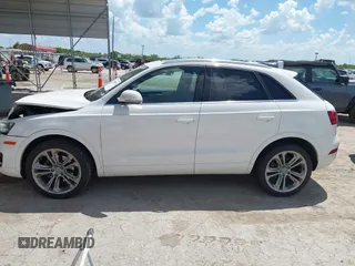 2015 Audi Q3 Prestige with VIN WA1GFCFS1FR007092, listed as a IAAI auction lot 42588730 with 85,290 mi miles and . Bid and sale history available at DreamBid. Image 14.