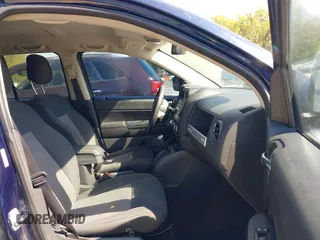 2014 Jeep Compass Sport with VIN 1C4NJCBB0ED660610, listed as a IAAI auction lot 40506737 with 209,670 mi miles. Bid and sale history available at carsss.com. Image 5.