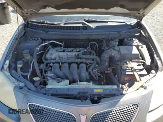 2006 Pontiac Vibe z VIN 5Y2SL65836Z406960, wystawiony jako Copart lot #53856715 z przebiegiem 299 999 mil mil oraz Szkoda całkowita • Salvage title. Historia ofert i sprzedaży dostępna na DreamBid. Obrazek 12.