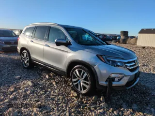 2017 Honda Pilot Touring with VIN 5FNYF6H9XHB074322, listed as a Copart auction lot 46639135 with 79,509 mi miles and Salvage Title. Bid and sale history available at DreamBid. Image 4.