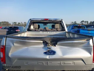 2018 Ford F-150 XL with VIN 1FTEW1E57JFC31779, listed as a IAAI auction lot 41784467 with 142,676 mi miles. Bid and sale history available at carsss.com. Image 6.