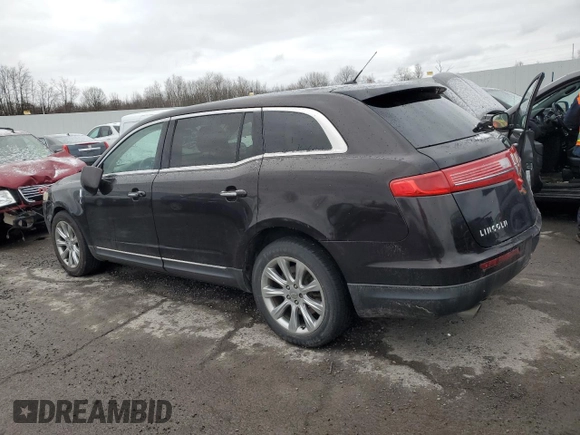 2014 Lincoln MKT with VIN 2LMHJ5FK9EBL50142, listed as a Copart auction lot 85564374 with 180,263 mi miles and Salvage Title. Bid and sale history available at DreamBid. Image 2.