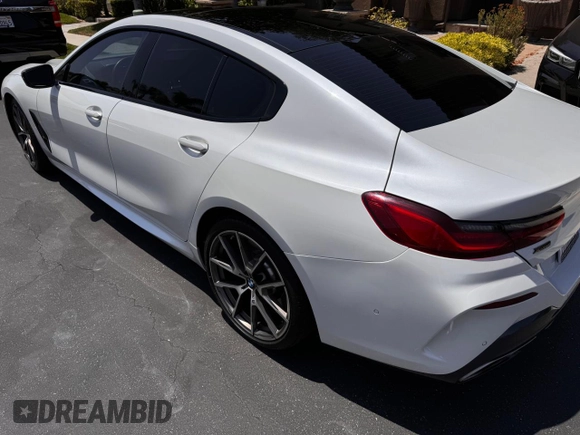 2020 BMW 8 Series M850i with VIN WBAGV8C01LBP48613, listed as a Copart auction lot 65496944 with 18,974 mi miles. Bid and sale history available at carsss.com. Image 3.