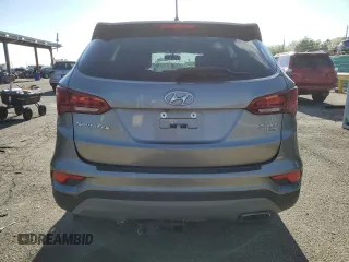 2018 Hyundai Santa Fe 2.4L с VIN 5XYZTDLB1JG542982, выставлен на аукционе Copart как лот 55081465 с пробегом 86 862 миль миль и Списание • Salvage title. История ставок и продаж доступна на DreamBid. Изображение 6.
