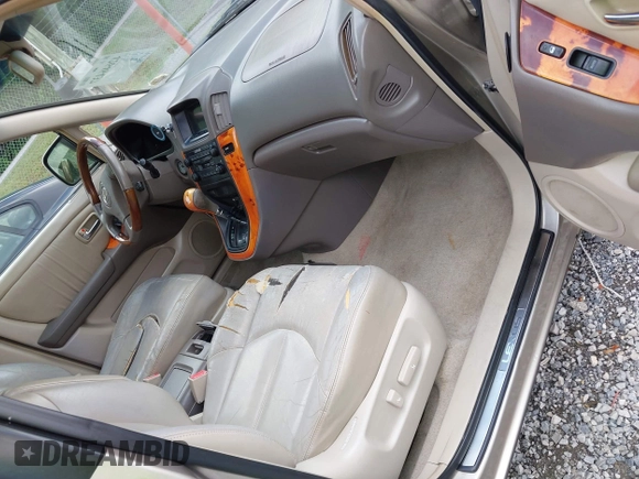 2002 Lexus RX 300 with VIN JTJGF10U220135180, listed as a IAAI auction lot 42646437 with 184,559 mi miles and . Bid and sale history available at DreamBid. Image 5.