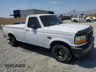 1996 Ford F-150 с VIN 1FTEF15Y3TLA34414, выставлен на аукционе Copart как лот 61026415 с пробегом 133 406 миль миль и Списание • Salvage title. История ставок и продаж доступна на DreamBid. Изображение 4.